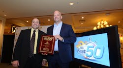 Dan Noble, COO of top-ranked NorthStar Home, receives the Fast50 award from Editor-in-Chief Paul Rothman. NorthStar is the first No. 1-ranked company with a nearly 100% focus on residential security in the five-year history of the Fast50.