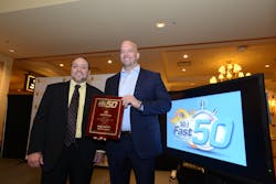 Dan Noble, COO of top-ranked NorthStar Home, receives the Fast50 award from Editor-in-Chief Paul Rothman. NorthStar is the first No. 1-ranked company with a nearly 100% focus on residential security in the five-year history of the Fast50.