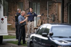 FBI evidence recovery team members search inside the Waldo Heights apartment complex at 8101 Campbell Street in Kansas City, Mo., on Sunday, July 17, 2016, in connection to the shooting in Baton Rouge, La., by accused shooter Gavin Eugene Long, 29, of Kansas City, which killed three police officers and wounded three more officers. FBI evidence recovery team members search inside the Waldo Heights apartment complex at 8101 Campbell Street in Kansas City, Mo., on Sunday, July 17, 2016, in connection to the shooting in Baton Rouge, La., by accused shooter Gavin Eugene Long, 29, of Kansas City, which killed three police officers and wounded three more officers.