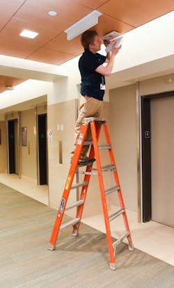 Advance Technology Technician Dan Roy works on a wireless RTLS installation for a customer at a prominent medical facility in Boston.