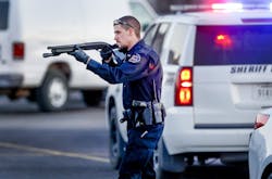 Police go through the parking lot of Excel Industries in Hesston, Kan., where a gunman reportedly killed up to seven people and injured many others on Thursday, Feb. 25, 2016. Police go through the parking lot of Excel Industries in Hesston, Kan., where a gunman reportedly killed up to seven people and injured many others on Thursday, Feb. 25, 2016.
