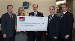 Securitas ES donated $7,200 to the National Law Enforcement Officers Memorial Fund as part of a booth promotion at ASIS. (L-R) Tom Nichols - Vice President Service Operations, SES; Terrie Ipson - Director, Marketing, SES; Craig Floyd - President & CEO, NLEOMF; Jon Adler - Vice Chairman, NLEOMF; James Osgood - Treasurer, NLEOMF.
