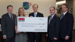 Securitas ES donated $7,200 to the National Law Enforcement Officers Memorial Fund as part of a booth promotion at ASIS. (L-R) Tom Nichols - Vice President Service Operations, SES; Terrie Ipson - Director, Marketing, SES; Craig Floyd - President & CEO, NLEOMF; Jon Adler - Vice Chairman, NLEOMF; James Osgood - Treasurer, NLEOMF. Securitas ES donated $7,200 to the National Law Enforcement Officers Memorial Fund as part of a booth promotion at ASIS. (L-R) Tom Nichols - Vice President Service Operations, SES; Terrie Ipson - Director, Marketing, SES; Craig Floyd - President & CEO, NLEOMF; Jon Adler - Vice Chairman, NLEOMF; James Osgood - Treasurer, NLEOMF.