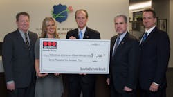 Securitas ES donated $7,200 to the National Law Enforcement Officers Memorial Fund as part of a booth promotion at ASIS. (L-R) Tom Nichols - Vice President Service Operations, SES; Terrie Ipson - Director, Marketing, SES; Craig Floyd - President &amp; CEO, NLEOMF; Jon Adler - Vice Chairman, NLEOMF; James Osgood - Treasurer, NLEOMF.