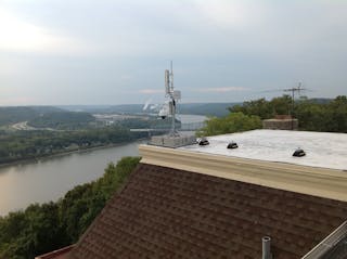 Cities like Cincinnati are planning expansion of municipal video surveillance operations. Shown here is a Cincinnati roof antenna with surveillance cameras.