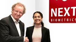 NEXT Biometric&apos;s Chairman of the Board Tore Etholm-Idsoe, left, shanks the hand of new CEO Ritu Favre.