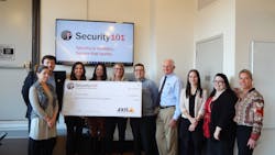 Nathan Zautcke (fifth from right), owner of Security 101's Detroit franchise, and his team present a check for the installation of an Axis video surveillance system and recorder to HOPE, a nonprofit Detroit civil and human rights organization, as part of Security 101’s 5th Annual Gift of Security program. Nathan Zautcke (fifth from right), owner of Security 101's Detroit franchise, and his team present a check for the installation of an Axis video surveillance system and recorder to HOPE, a nonprofit Detroit civil and human rights organization, as part of Security 101’s 5th Annual Gift of Security program.