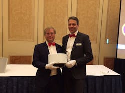 Martin Gren, left, and Fredrik Nilsson, right, hold Axis' new IP radar detector at ISC West 2017. Martin Gren, left, and Fredrik Nilsson, right, hold Axis' new IP radar detector at ISC West 2017.