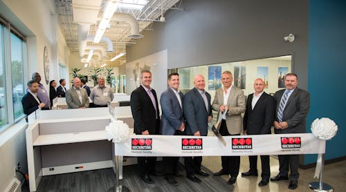 At the ribbon cutting of Securitas ES&apos; Canadian Headquarters: Jeff Hennessy, Area Installation Manager, SES Canada; Kevin Engelhardt, Executive Vice President Operations &amp; Enterprise, SES; Dan Marston, Senior Director &amp; General Manager, SES Canada; Tony Byerly, President, SES; Chris Jaynes, district Service Manager, SES Canada; and Mark Drysdale, Area Installation Manager, SES Canada.