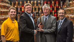 Hikvision accepts its award from the Koorsen team in Indianapolis. From left to right: Keith Koorsen, vice president special projects at Koorsen; Bryan Smith, Koorsen director of business security; Phil Smith, Hikvision Midwest RSM; Len Friedman, Hikvision director of sales.