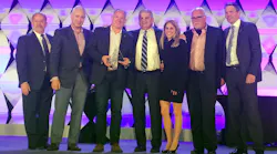 The Convergint team accepts the 2017 National Systems Integrator of the Year Award from Larry Newman (far left) and Fredrik Nilsson (far right) at Axis Connect & Converge in Seattle.