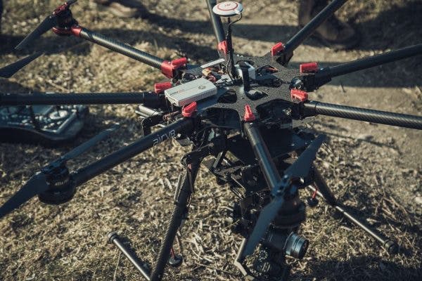 Unlike use by hobbyists, professional security applications often require instantaneous capture and transmission of video streams beyond the technological capabilities of previous drone-based systems.