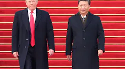 Chinese President Xi Jinping, right, holds a grand ceremony to welcome U.S. President Donald Trump at the square outside the east gate of the Great Hall of the People in Beijing, capital of China, Nov. 9, 2017.