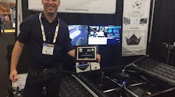 Ido Gur, CEO of Easy Aerial, shows off his company&rsquo;s Tech Tank Award at ISC East in New York.
