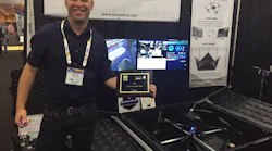 Ido Gur, CEO of Easy Aerial, shows off his company’s Tech Tank Award at ISC East in New York.