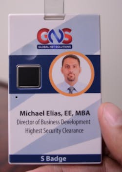 The S-Badge from Global Net Solutions (GNS) is an Internet of Things (IoT)-based access control solution that leverages a combination of Bluetooth Low Energy (BLE), multiple data sensors and RFID technology to track people and assets throughout a facility or campus environment. The S-Badge from Global Net Solutions (GNS) is an Internet of Things (IoT)-based access control solution that leverages a combination of Bluetooth Low Energy (BLE), multiple data sensors and RFID technology to track people and assets throughout a facility or campus environment.