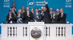 ADT, Inc. Chief Executive Officer Timothy J. Whall, joined by members of ADT&apos;s senior executive team and board of directors, rings the NYSE Opening Bell.