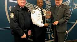 Marietta (GA) Police Chief Dan Flynn and SIAC Law Enforcement National Liaison Glen Mowrey Present Security Industry Alarm Coalition Directors Award of Distinction for Excellence in Alarm Management to Atlanta (GA) Police Deputy Chief Rodney Bryant.