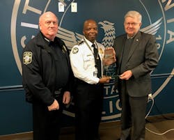 Marietta (GA) Police Chief Dan Flynn and SIAC Law Enforcement National Liaison Glen Mowrey Present Security Industry Alarm Coalition Directors Award of Distinction for Excellence in Alarm Management to Atlanta (GA) Police Deputy Chief Rodney Bryant. Marietta (GA) Police Chief Dan Flynn and SIAC Law Enforcement National Liaison Glen Mowrey Present Security Industry Alarm Coalition Directors Award of Distinction for Excellence in Alarm Management to Atlanta (GA) Police Deputy Chief Rodney Bryant.