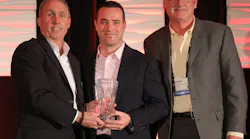 JR Andrews and Bryan McGee of Altronix (right) accept the Superstar Award from PSA’s Craig Patterson.