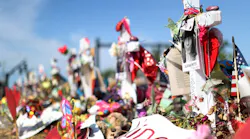 The makeshift memorial in front of Marjory Stoneman High for the seventeen killed in the Parkland massacre.