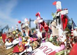 The makeshift memorial in front of Marjory Stoneman High for the seventeen killed in the Parkland massacre. The makeshift memorial in front of Marjory Stoneman High for the seventeen killed in the Parkland massacre.