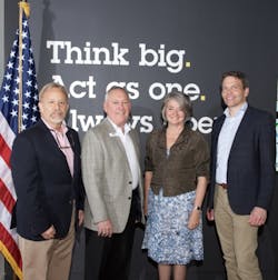 From left to right: Axis Communications&rsquo; Senior Director of Sales, Larry Newman, Business Area Director for the Mid-Atlantic, Dave Tynan, the Swedish Ambassador to the U.S., Karin Olofsdotter, and Axis&rsquo; VP, Americas, Fredrik Nilsson celebrate the grand opening of the newest AEC in Washington, DC.