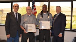 Officers Manuel Byrge (center left) and Gordon Collier (center right) were named Securitas Officer of the Year for Performance and Heroism, respectively. President and CEO, Securitas North America Santiago Galaz (far left) and Chief Operating Officer Bill Barthelemy.