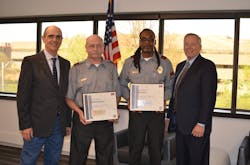 Officers Manuel Byrge (center left) and Gordon Collier (center right) were named Securitas Officer of the Year for Performance and Heroism, respectively. President and CEO, Securitas North America Santiago Galaz (far left) and Chief Operating Officer Bill Barthelemy. Officers Manuel Byrge (center left) and Gordon Collier (center right) were named Securitas Officer of the Year for Performance and Heroism, respectively. President and CEO, Securitas North America Santiago Galaz (far left) and Chief Operating Officer Bill Barthelemy.