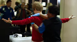 A Transportation Security Administration officer performs a pat-down search on a passenger at Los Angeles International Airport on March 31, 2011.