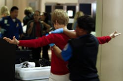 A Transportation Security Administration officer performs a pat-down search on a passenger at Los Angeles International Airport on March 31, 2011. A Transportation Security Administration officer performs a pat-down search on a passenger at Los Angeles International Airport on March 31, 2011.