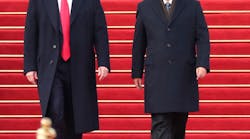 Chinese President Xi Jinping, right, welcomes President Donald Trump at the square outside the east gate of the Great Hall of the People in Beijing on Nov. 9, 2017.