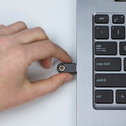 The YubiKey enables two-factor network authentication with the touch of a finger. The YubiKey enables two-factor network authentication with the touch of a finger.