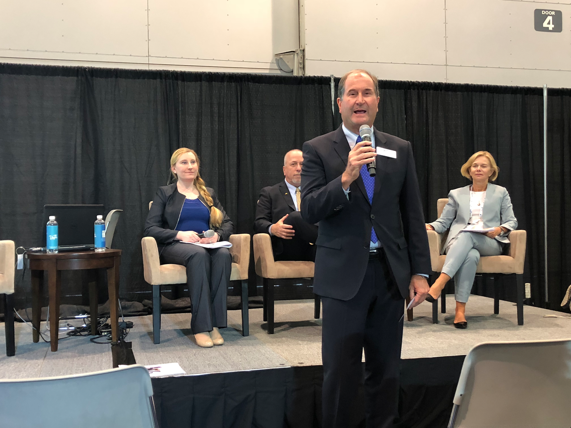 SIA Charman Scott Schafer addresses attendees at GSX while Angela Osborne of Guidepost Solutions, Scott Dunn of Axis Communications and Kathy Lavinder of Security & Investigative Placement look on.