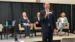SIA Charman Scott Schafer addresses attendees at GSX while Angela Osborne of Guidepost Solutions, Scott Dunn of Axis Communications and Kathy Lavinder of Security & Investigative Placement look on.