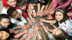 For years, Silent Guard President and CEO Dwight Sears has been spreading a message of kindness in the classrooms of Kentucky. He says 'the heart on the hand is our international symbol for kindness.'