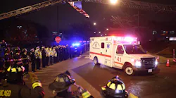 Chicago firefighters and police salute the ambulance carrying the body of Officer Samuel Jimenez outside of the Medical Examiners office at Leavitt and West Harrison streets in Chicago on Nov. 19, 2018. Jimenez was killed at Mercy Hospital today.