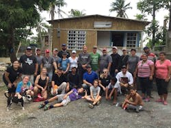First row (l to r) - Phillippe Forman; Kyle Fletcher; Boys who live in the home. Second row (l to r) - Gwynn Turner; Stephanie Lutz, Wesco; George Fletcher, Mission 500; Guillermo, Site Foreman; Daniel Plaza, Aiphone; Jackie Pruter, Brinks; Matt Rios, Axis; Women who live in home. Third row (l to r) - Sarahi Sanpedro, Brinks; Jason Lutz, Residio, Alan Forman; Altronix, Mariane Chew, Hikvision; Martha Entwistle, Hikvision; Shane Nikov, Hikvision; Rick Bunnell, Retired, Schneider Electric; Nick Pintaro, Axis; Patrick Cooke, Milestone; Brian Hayes, Milestone; Stephanie Mayes, Synetics Global; Dad of the house. Fourth row (l to r) – Roland Cruz, FE Puerto Rico; Tom Nolan, Mission 500; Eric Hattey, Brinks First row (l to r) - Phillippe Forman; Kyle Fletcher; Boys who live in the home. Second row (l to r) - Gwynn Turner; Stephanie Lutz, Wesco; George Fletcher, Mission 500; Guillermo, Site Foreman; Daniel Plaza, Aiphone; Jackie Pruter, Brinks; Matt Rios, Axis; Women who live in home. Third row (l to r) - Sarahi Sanpedro, Brinks; Jason Lutz, Residio, Alan Forman; Altronix, Mariane Chew, Hikvision; Martha Entwistle, Hikvision; Shane Nikov, Hikvision; Rick Bunnell, Retired, Schneider Electric; Nick Pintaro, Axis; Patrick Cooke, Milestone; Brian Hayes, Milestone; Stephanie Mayes, Synetics Global; Dad of the house. Fourth row (l to r) – Roland Cruz, FE Puerto Rico; Tom Nolan, Mission 500; Eric Hattey, Brinks