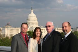George Gunning (center), along with former ESA president Mike Miller, the late Tonja Jenkins, and current ESA Executive Director and CEO Merlin Guilbeau, took an active role in advocating for security industry-related legislation. George Gunning (center), along with former ESA president Mike Miller, the late Tonja Jenkins, and current ESA Executive Director and CEO Merlin Guilbeau, took an active role in advocating for security industry-related legislation.