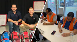 Hikvision employees Anthony Martinez and Shane Nikov in front of 700 backpacks filled with school supplies by volunteers and donated to students at Crosspointe Elementary School in Boynton Beach, Fla.