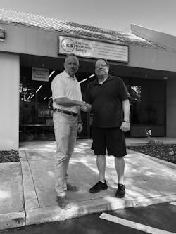 (L-R) Jason Dennis, Managing Partner, Lone Star Systems Supply and Dave Kelly, Regional Manager West of Custom Electronic Supply.