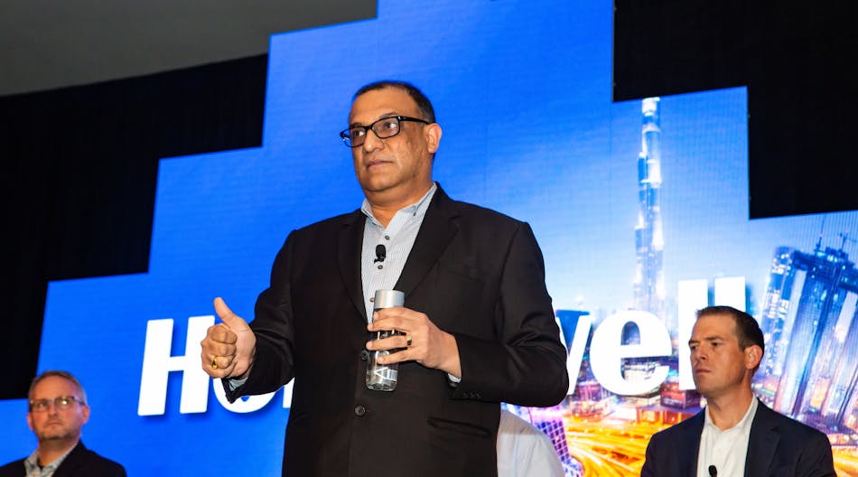 Vikas Chadha, Vice President for Commercial Security at Honeywell, addresses attendees during a panel discussion at the company&apos;s recent Building for the Future event in Miami.