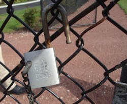 Open padlocks like the one pictured above can present significant security vulnerabilities to facilities. Open padlocks like the one pictured above can present significant security vulnerabilities to facilities.
