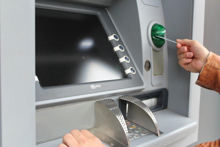 A Romanian national was sentenced this week to five years in prison for an ATM skimming scheme that used hidden card-reading devices and pinhole cameras at New Jersey and New York banks to steal at least $390,141 from customer accounts.