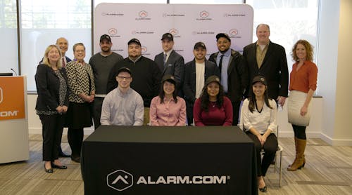 Representatives of Alarm.com, the Office of Governor Northam, Northern Virginia Community College and Fairfax County Economic Development Authority stand with the first apprentices to join the new Alarm.com Apprenticeship program.