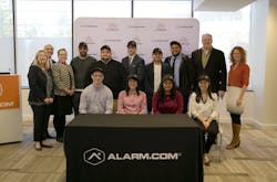 Representatives of Alarm.com, the Office of Governor Northam, Northern Virginia Community College and Fairfax County Economic Development Authority stand with the first apprentices to join the new Alarm.com Apprenticeship program.