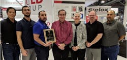 Rich McMillan, President of MCM Integrator Systems, and team accept the Sielox Integrator of the Year award. Rich McMillan, President of MCM Integrator Systems, and team accept the Sielox Integrator of the Year award.