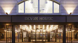 Devon House at St. Katharine Docks, an office building in London’s East Side, has installed a unique TQM manual revolving door at the main entrance, in addition to two arrays of Speedlane Swing optical turnstiles, to increase lobby security.