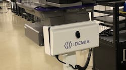 A look at the Idemia ID analysis machines in use for a pilot project at Ronald Reagan Airport. The officer stands behind the shield, and human-to-human contact is non-existent.