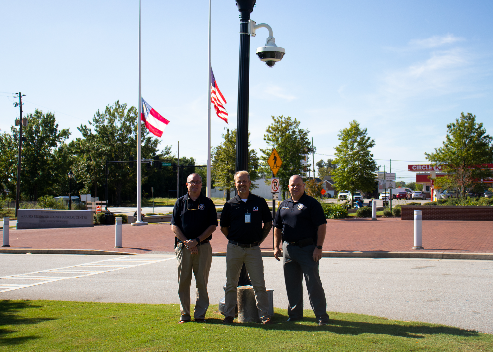 From left-to-right: Capt. Jeff Barrett, Executive Officer for the Richmond County Marshal's Office, Brett Cooke, Senior Project Manager at A3 Communications, and Lt. Steven Douglas of the Richmond County Marshal's Office security division, stand outside the Augusta-Richmond County Judicial Center.